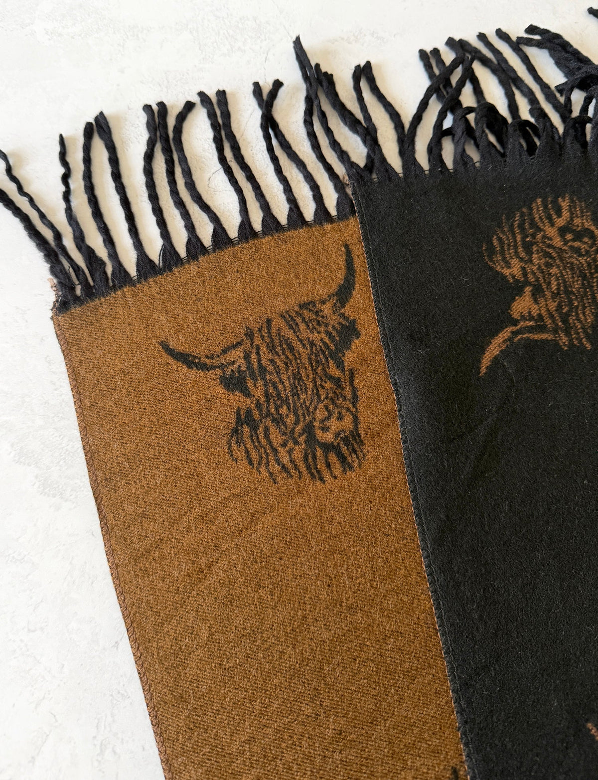 Floral scarf with an elegant printed design, adding a touch of colour and style to everyday outfits and special occasions.