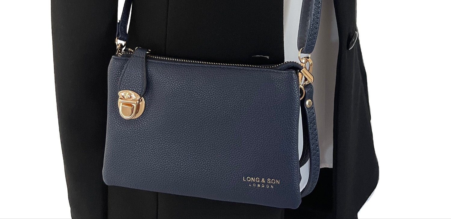 SMALL MULTI-POCKET CROSS BODY CLUTCH BAG WITH WRISTLET - NAVY BLUE