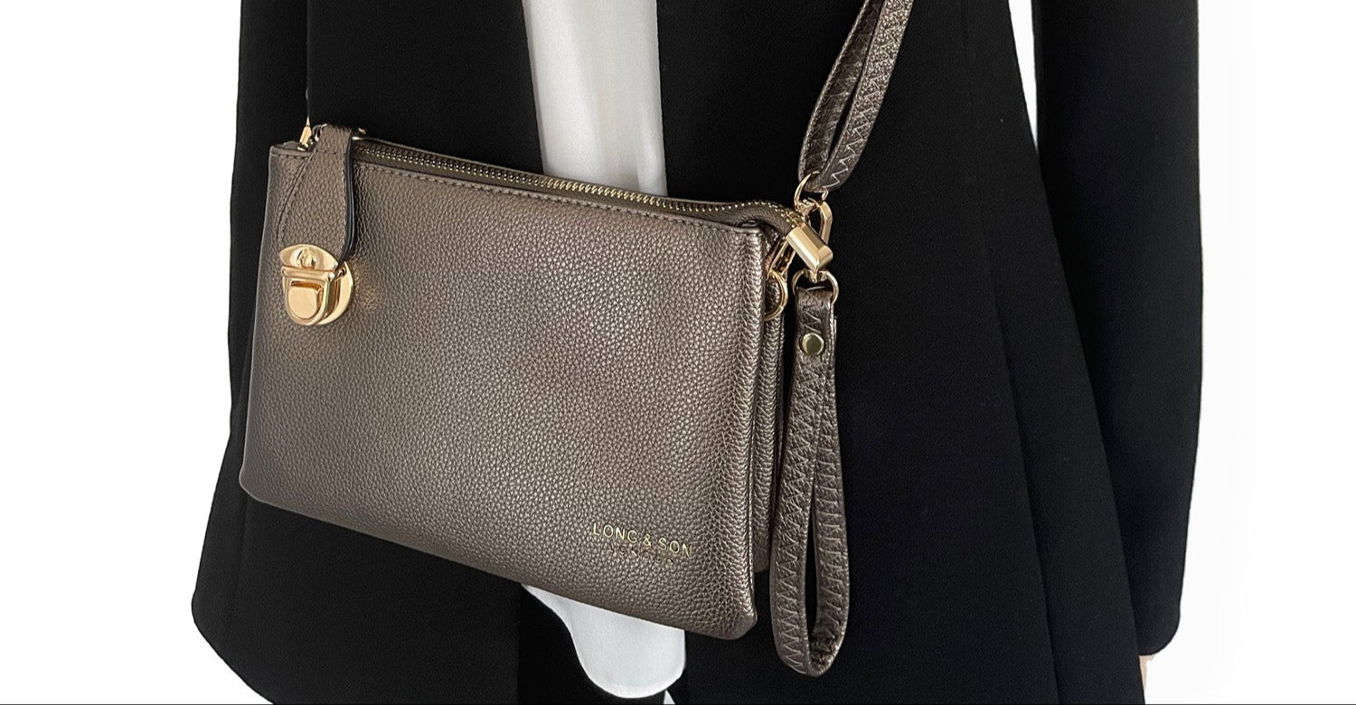 SMALL MULTI-POCKET CROSS BODY CLUTCH BAG WITH WRISTLET - PEWTER